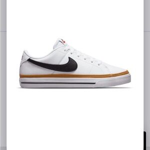 Nike women’s Legacy White Leather Sneakers with Black Swoosh and Tan Accent